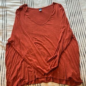 burnt orangey rust colored v neck